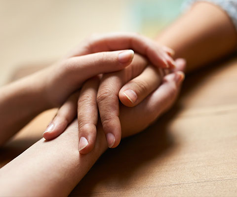 holding-hands-532050978