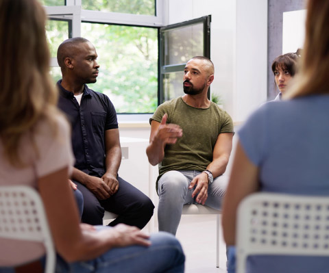 A group of people having a meeting