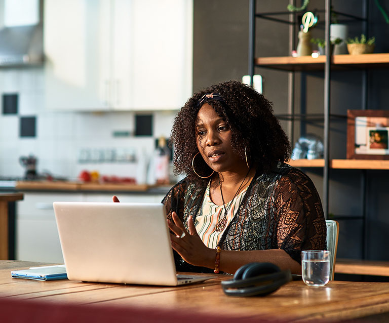 Woman working using her laptop computer